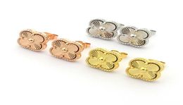 new fashion brand women charm earrings stud fourleaf textured for women style single flower love Jewellery whole8638529