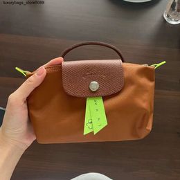 Luxury Handbag Designer Shoulder Bag Crossbody Bag Mini Dumpling Bag Bag Bag Lightweight Crossbody Bag Nylon Bag Commuter Bag166L
