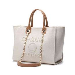 Designer Luxury Classic Beach Bags Canvas Pearl Evening Bag Portable Shopping Large Capacity Handbag Brand Ch Women Handbags Label Back 281W