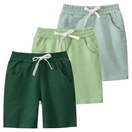Shorts 2024 Summer New Solid Color Sports Shorts Suitable for Childrens Clothing Elastic Waist Shorts Cotton Childrens ClothingL2405