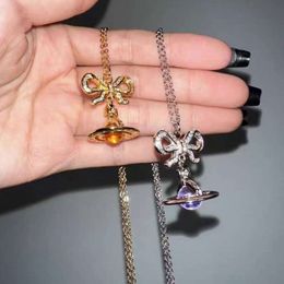 designer vivienewestwood viviane viviennes westwood Jewellery pendant necklace Dowager Bow Purple Saturn Necklace Womens Luxury Planet Pendant Sweater Neckchain