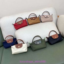 Designer -Bag -Läden sind 95% Rabatt auf Mini -Single -Griff -Mobiltelefon tragbarer Null -Brieftaschen -Womens ClothJug7