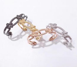 2021 high end jewelry designers love lock bracelet charm bangle gold plating on copper healing cross knot his and hers bracelets b4343305