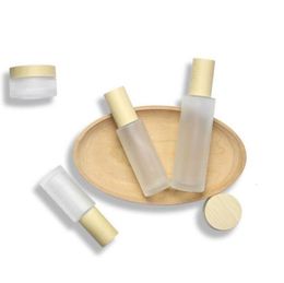 60ml 100ml 20ml 30ml 40ml 80ml 50ml Frost Cream Jar with Wooden Lids Cap Frosted Glass Lotion Spray Bottle Cosmetic Container Epac4692255
