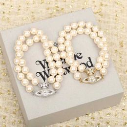Selected Westwood Double layered Pearl Bracelet for Women Light Luxury Small and Popular High Sense Saturn