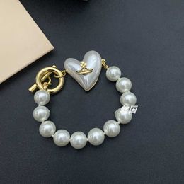 Brand Westwood Saturn love pearl bracelet female star same large peach heart high version