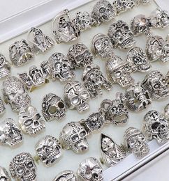 Whole Bulk 50pcsLots Punk Metal Skull Rings For Men Women Size 8 to 11 Mix Style9269379