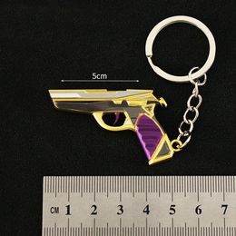 Mini roxo de pistola de pistola de pistola de ouro roxo modelo de chaveiro de chaves de chave de calcha de calcha de zinco de calcha de carro