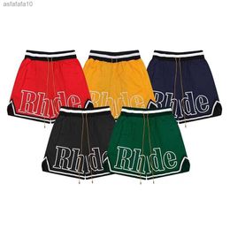 Designer Shorts Rhude Mens Mesh Short Summer Fashion Beach Elastic Band Pants Men High Quality Street Wear Red Blue Black Purple Pants LAFE