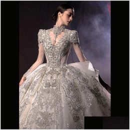 A-Line Wedding Dresses 2024 Arabic Long Sleeves Beaded Pearls Crystals Sequined Satin Bridal Gowns Luxury Dubai Empire Ball Gown Princ Otbtf