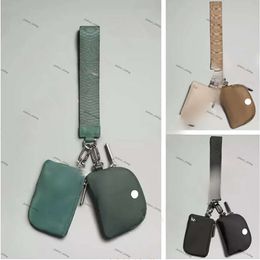 lululemo Designer Keychains Fashion LU-Metal New Dual Pouch Wristlet Pochette Double Wristlet Strap Waterproof Mini Yoga Bag Detachable Key Chain 62 870