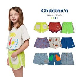Shorts Childrens pants 2024 Spring/Summer European and American style thin cartoon denim shorts with tie up sports pants d240510