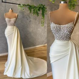 2021 Sexy Arabic Mermaid White Evening Dresses Wear Spaghetti Straps Sleevelesss Crystal Beads Pearls Satin Formal Prom Gowns Party Gow 1838