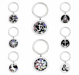 u27 Key ring Perfume Aromatherapy Essential oil Diffuser Locket Key chain Alloy 30mm Hollow Locket Key Ring with 5pads randomly7280523