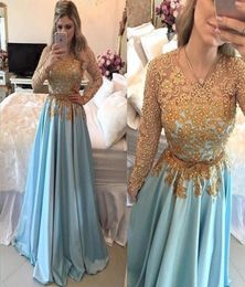 ALine Jewel Long Sleeves Blue Satin Prom Dress with Sash Beading Appliques Gold Lace Applique Evening Dress7702886