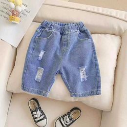 Shorts IENENS Fashion Hole Jeans Shorts Boys Casual Shorts Baby Loose Beach Shorts Summer Childrens Clothing Solid Colour Wash Jeans d240510