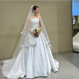 Elegant Long Strapless Satin Wedding Dresses with Pockets A-Line Ivory Sleeveless Sweep Train Lace Up Back Simple Bridal Gowns for Women