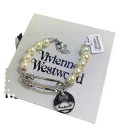 Brand Westwood Pins Round Label Saturn Pearl Bracelet Female Light Luxury Small and Popular Paper Clips Planet Nail With logo