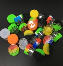 Whole 6 Ml Glass Bottle Non Stick Concentrate Container Wax Dab Jar Oil Container With Colourful Silicone Cover 150 Pcslot4077933