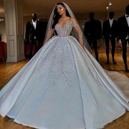 Luxurious Arabic Crystals Sequins Wedding Dresses Ball Gown 2021 Sheer Long Sleeves Bling Sparkly Dubai Garden Bridal Gowns Court Train 318B