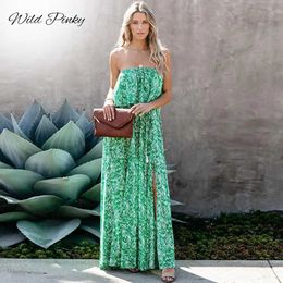 Basic Casual Dresses WildPinky Long Holiday Style Leaf Print Dress Womens Ruffled Back Free Split Dress New Fashion Summer Beach Dress VestidosL2405