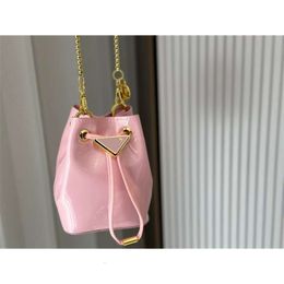High quality Designer Bag Lacquer leather mini bucket bag 2024 new single shoulder bags crossbody bag handheld mini mouth red bag womens P home Chain Bucket Bags