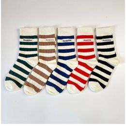 Men's Socks She said that Korean Spring/Summer Stripe Co branded Socks Mens and Womens Mid length English Embroidered Sports Socks ins