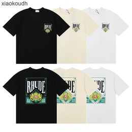 Rhude High end designer T shirts for 24 New High Street Fashion Green Card Printed Round Neck Pure Cotton Casual Short sleeved Tshirt for Men and Women With 1:1 original
