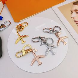 Designer Fashion Aircraft Keychains Womens Mens Metal Plane Key Chains Pendants Alloy Aeroplane Pendant Trinkets Charm Keychain Ornament Letters Keys Rings