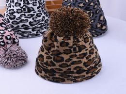 Leopard Knitted Hat Pom Pom Fur Ball Beanies Women Winter Warm Wool Knitting Hat Outdoor Keep Warm Beanie Caps Party Hats w004278654446