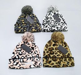 New printed unisex fashion cute for fallwinterhairball cap color warm knitted hat 4 color beanie5020811