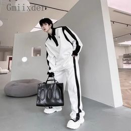 Elegant black and white contrasting sportswear set long sleeved polo shirt sports pants two-piece set casual and handsome sportswear 240510
