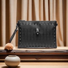 Factory outlet men shoulder bags street personality skull punk bag solid color Joker black embossed leather handbag large rivet mobile phone coin purse 8935#