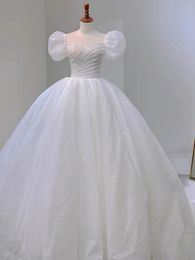 Abiti da sposa con paillettes bianchi glitter con perle in rilievo 2024 maniche a soffio corto in filo posteriore lungo abiti da sposa principessa da sposa