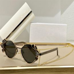 Sunglasses For Women Summer style AntiUltraviolet SHINE Retro oval metal frame Diamond chain fashion Eyeglasses Random Box9931041