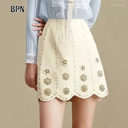 Skirts BPN Temperament Patchwork Diamonds For Women High Waist Solid Slimming Elegant A Line Skirt Female Fashion Clothing Style