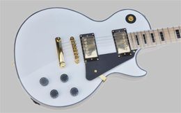 White electric guitar mahogany body, ebony fingerboard, gold accessories,