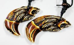 YQTDMY 12 pcs Cool Retro Punk Lion Pendant Power Tribal Wood Beads Choker Wolf Tooth Necklace Talisman Imitation20088422101017