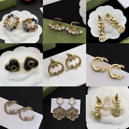 Moda Luxo Brincos de trevo de quatro folhas de quatro folhas NACHRE 18K Brincos de designer de ágata banhados a ouro para mulheres Brincos de alta qualidade Jóias