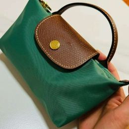 Handbag designer's new mini Dumpling bag High appearance Mini phone bag Coin purse crossbody bag Ladies factory promotionHUWA