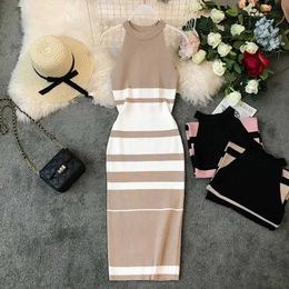 Basic Casual Dresses 2024 Summer Womens Hanging Neck Knitted Long Dress Round Neck Stripe Contrast Colour Waist Slim Ming Knitted Long Dress Office WomenL2405