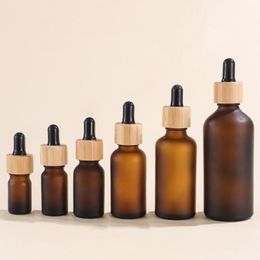 Wholesale Frosted Glass Essense Bottles 5-100ml Brown Cosmetic Packaging with Bamboo Lids and Pipette Qfdhj Daosr