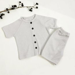 Pyjama set summer baby waffle Pyjamas soft cotton texture short sleeved casual wear suitable for infants and children 240428