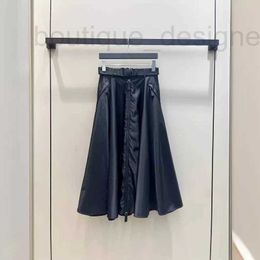 Skirts designer brand Belt High Waisted Black Mud Dragon Mid Length Skirt 2024 Spring New Fluffy A-line Fish Tail Pleated Long UCVL