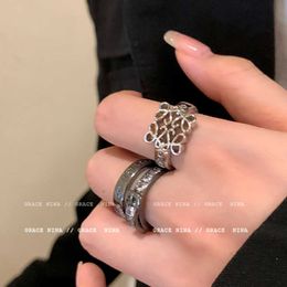 Designer Unusual Westwoods hollowed out letter ring female niche design unique couple new Nail