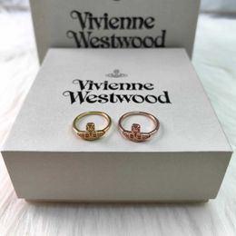 Brand Westwoods New Floating Point Diamondless Saturn Ring Female Simple and Unique Personalised Design Earrings Nail