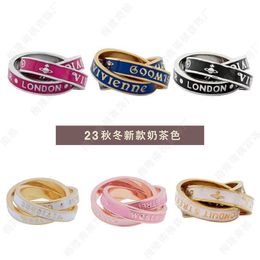 Brand High version Westwoods new autumn and winter milk tea color dynamic three ring couple Nail