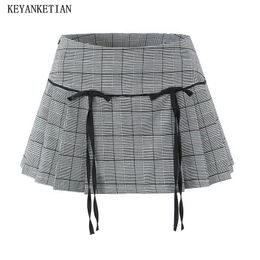 KEYANKETIAN Y2K Bow Decoration Plaid Mini Skirt Womens Side Zipper Low-rise A-line Skirt Slim Sweet Pantskirt 240513