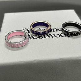 Designer Westwoods enamel letter ring is simple and fashionable with multi-color couple rings straight hair Nail