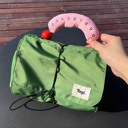 Hardou Egg Roll Organizer Bag Cute Makeup Bag Portable Large Capacity Handbag 240510